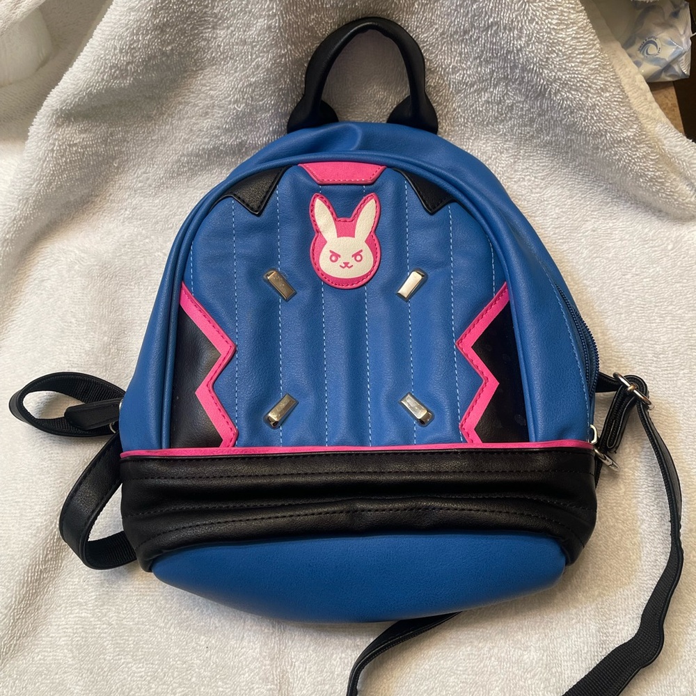 Overwatch Blue and Black Mini Backpack with Pink Accents used